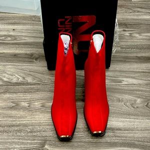 Brand new Women Red Booties size 12 by Ninety Union
